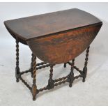 An early 20th century oak barleytwist gateleg table, width when extended 101cm.