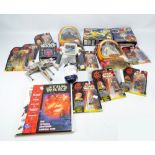 A collection of boxed Star Wars collectables and books to include boxed figures of Jar Jar Binks,