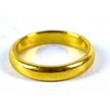 A 22ct yellow gold wedding band, size L, approx 5g.