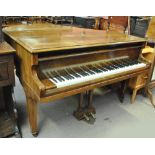 A Challen walnut cased baby grand piano, royal appointment decal to interior,