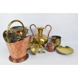 A group of metalware including a small copper kettle, a copper and brass coal bucket,