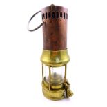 A circa 1900 Alfred Ellis of Wakefield Clanny style miner's flame safety lamp with wide middle ring