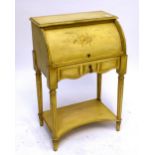 A 20th century cream painted distressed cylinder roll top bureau with floral and foliate decoration,