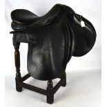 An approx 19" black general purpose saddle, made by Specialist Saddlers.
