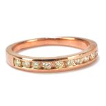 A 9ct rose gold and diamond half eternity ring, size M, approx 1.8g.