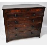 A Victorian mahogany and crossbanded chest of two short a three long drawers with secret drawer to