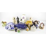 A collection of ceramics including a pair of reproduction Staffordshire dogs, a barge ware teapot,