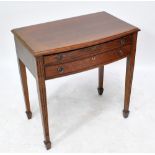 An oak table two drawer canteen of twelve setting cutlery comprising dinner knives, salad knives,