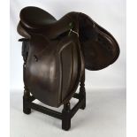 An approx 18.5" brown general purpose saddle, made by Exselle.