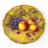 A Royal Worcester cabinet plate painted with apples and grapes with gilt decorated border,