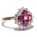 An 18ct white gold and platinum diamond and ruby cluster ring,