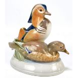 ROYAL COPENHAGEN; a group of two ducks with signature to the moulding, painted marks to base, no.