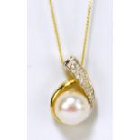 A 9ct yellow gold, diamond and pearl set pendant supported on a fine link chain.