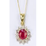 A 9ct yellow gold ruby and diamond floral set pendant suspended on a 9ct fine link gold chain,