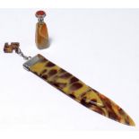 A circa 1900 American sterling silver mounted faux tortoiseshell bookmark with fylfot fob to the