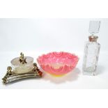 An electroplated and clear pressed glass butter dish with sea creature shaped finial and similarly