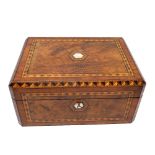 A Victorian inlaid walnut sewing box with crossbanding and centred with mother of pearl,