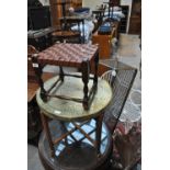 A Benares table embossed with Arabic calligraphy on ornamental ground on folding stand,