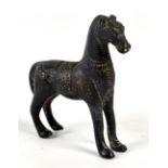 A 17th century bronze model horse with finely carved detail, length approx 7.5cm.