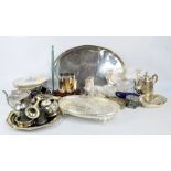 A group of electroplated items including a large oval galleried tray, a twin handled bottle coaster,