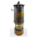 A 1950s Prestwich patent Protector Type SL miner's safety lamp, stamped '53' to the base,