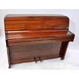 ZENDER; a mahogany framed upright piano, width 125.5cm.