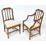 A set of six Edwardian mahogany dining chairs on square tapering front legs to spade feet (4+2).