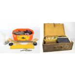 A quantity of Meccano construction components including wheels, tyres, flat sections, straights,