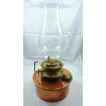 A portable hand lamp with cooper fount, height 26cm including chimney.