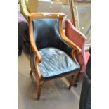 A Biedermeier style armchair with studded leather padded back and seat,