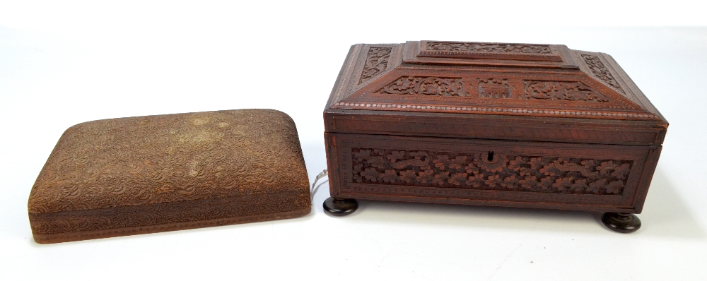 Two Eastern carved wooden boxes with hinged lids (2).