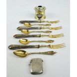 A set of four late 19th century German 800 grade silver handled dessert forks and a part set of