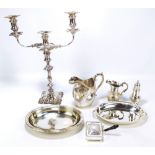 A small group of electroplated items including an oval entree dish, a candelabrum,