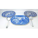 Three 19th century willow pattern decorated oval platters in various sizes,