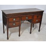 An early 20th century mahogany sideboard on square tapering supports with spade feet, width 149cm.