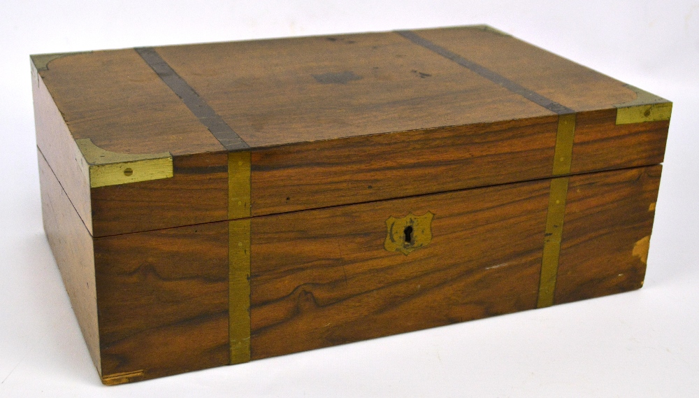 A Victorian walnut brass bound writing slope with fitted interior, width 35.5cm.