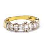 An 18ct yellow gold and diamond half eternity ring,