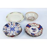 Six Japanese Meiji period porcelain Imari circular plates with moulded bodies,