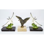 A pair of Art Deco style French painted spelter bookends modelled as birds,