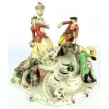 A large Nymphenburg porcelain figural porcelain group set with numerous figures, hounds,