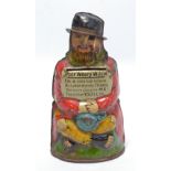 An early 20th century German tinplate money box modelled as a seated tramp figure,