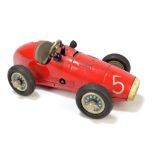An unboxed Schuco Grand Prix Racer 1070, numbered 5, with associated key, length 17cm.