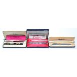 A Parker three piece set comprising a fountain pen, a ball pen and a propelling pencil, cased,