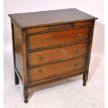 An early 20th century oak three drawer chest with carved and moulded detail, width 90.5cm.