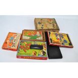 A collection of vintage boxed games including Blow Football, Lotto, Solitaire,