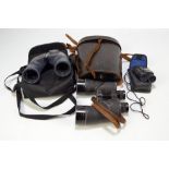 A pair of military issued 7x50 binoculars, dated 1944 and stamped 'Rel/Canada', cased,