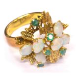 A 14ct yellow gold opal and emerald ring,