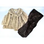 A silver mink fur short jacket with internal label for Browns of Chester and a further brown fur