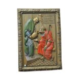 A polychrome painted carved wooden panel depicting the Good Samaritan,