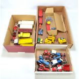 A collection of various diecast vehicles including Dinky with a series of tractors, trucks,